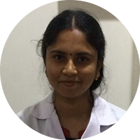 Photograph of Dr. Shanmugapriya working as a Molecular Biologist in Anderson Clinical Genetics.